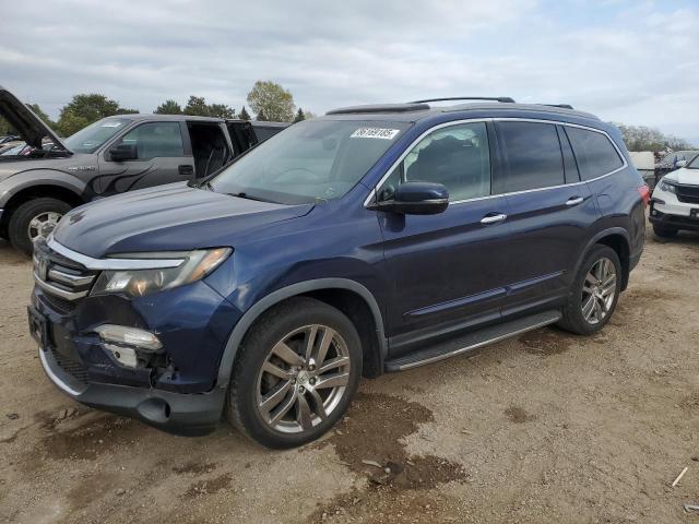 2016 HONDA PILOT TOUR — VIN 5FNYF6H92GB018132